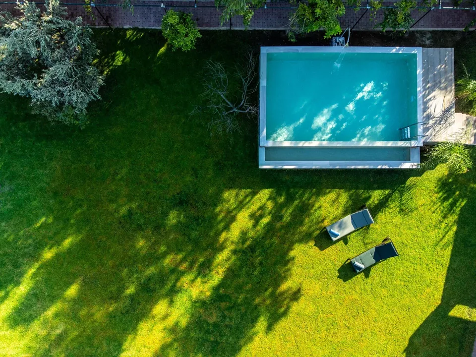 Aitheria Pool and Green Lawn