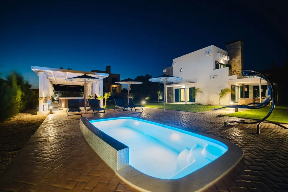 Amalthia Illuminated Pool at Night